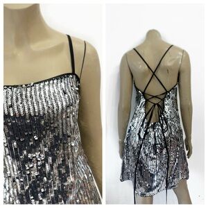 H&M silver sequin tank mini dress with low back. Size XL.
